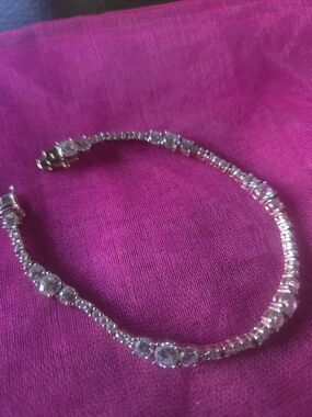 sterling-silver CZ tennis-style bracelet, with larger round CZ 925